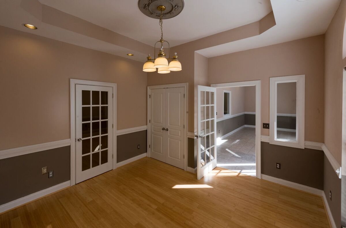 Office room with multiple doors